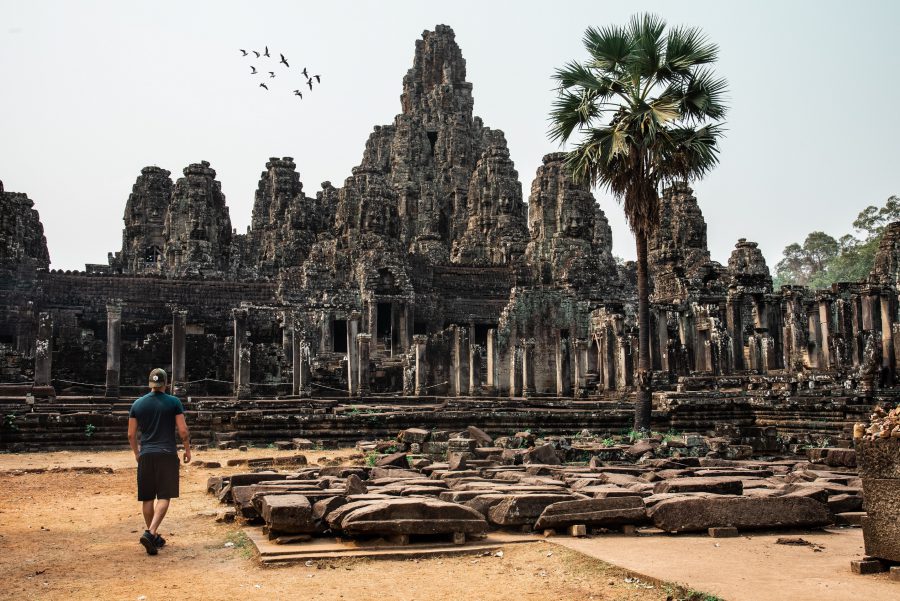 Man looking at Cambodia temple