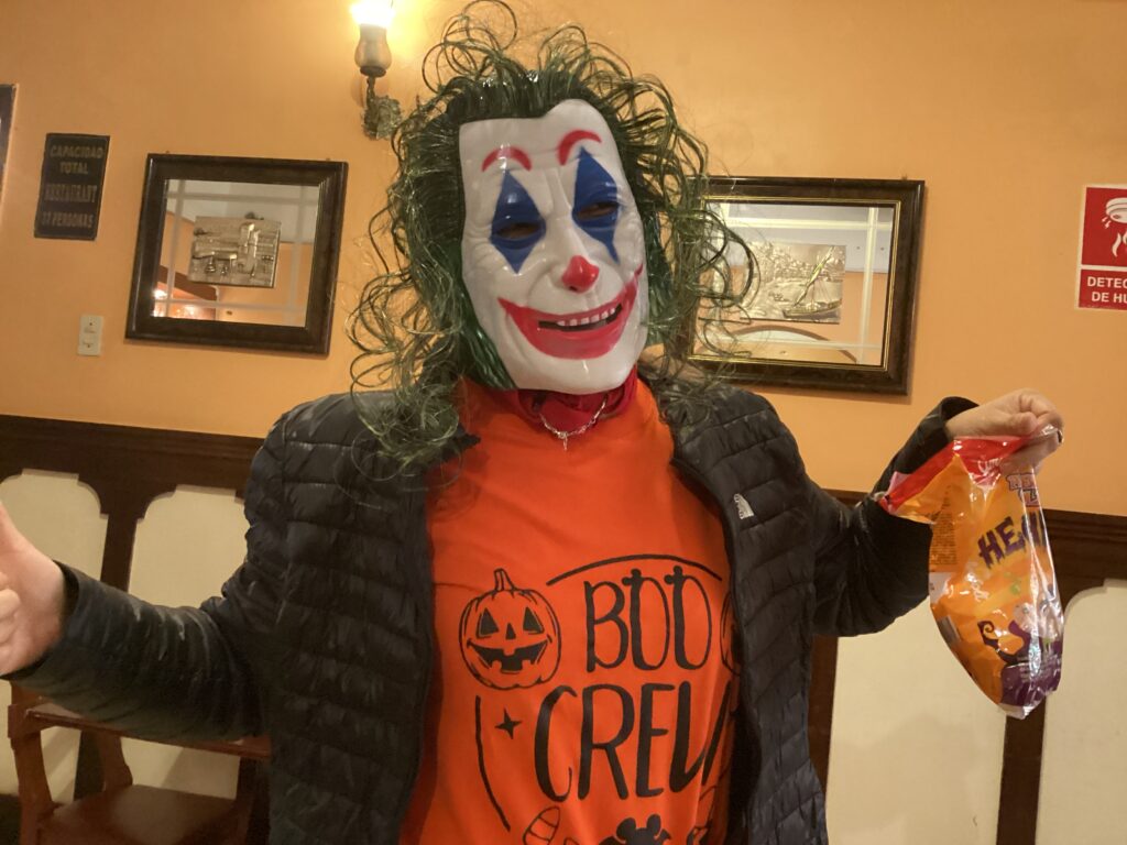 DWC volunteer wearing clown Halloween mask