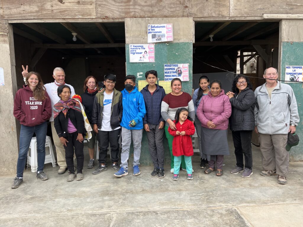 Volunteer with locals in Peru