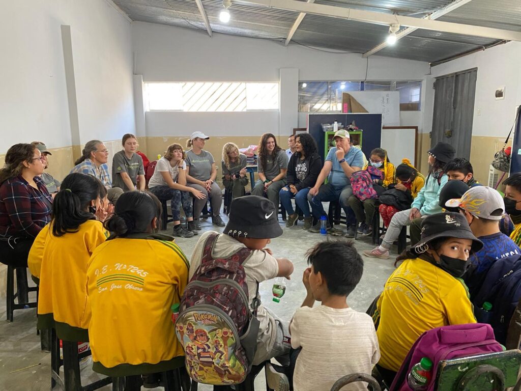 DWC Volunteers in Classroom with children in Peru