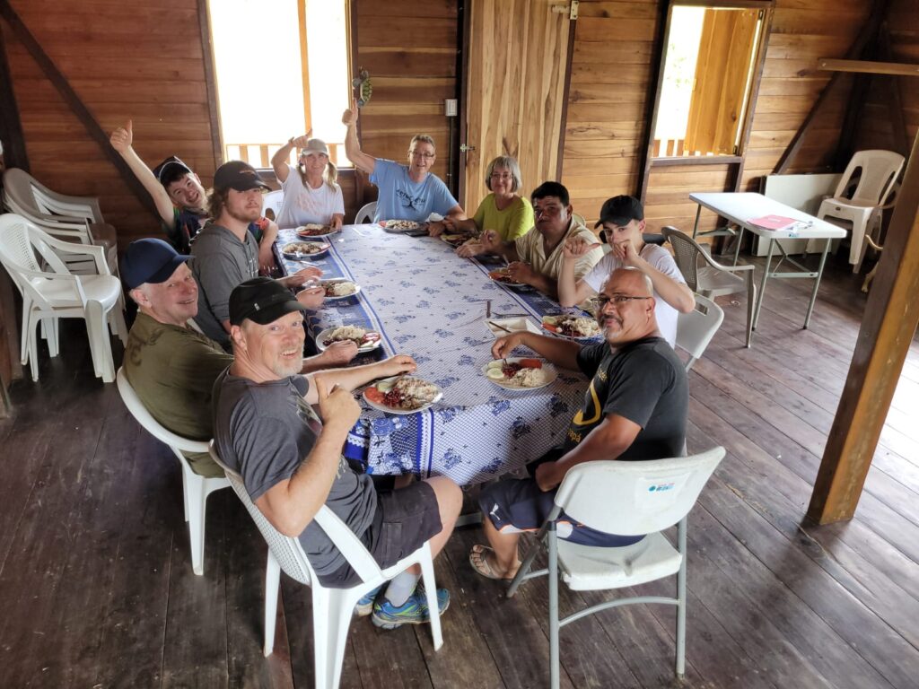 DWC volunteers at dinner table Costa Rica
