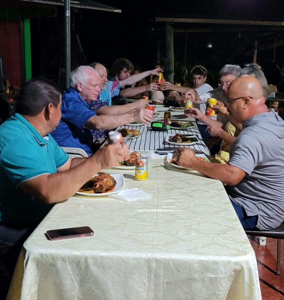 DWC volunteers at dinner table Costa Rica