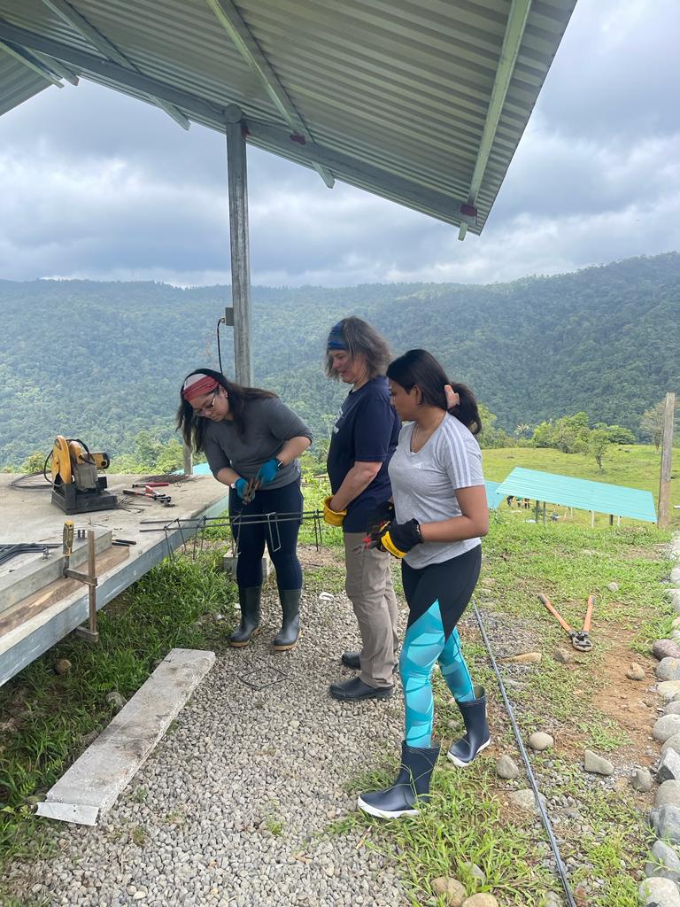 Salesforce volunteers making rebar towers Costa Rica