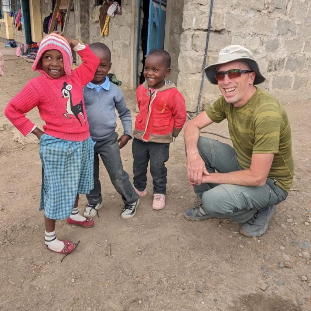 DWC volunteers with schoolchildren in Kenya