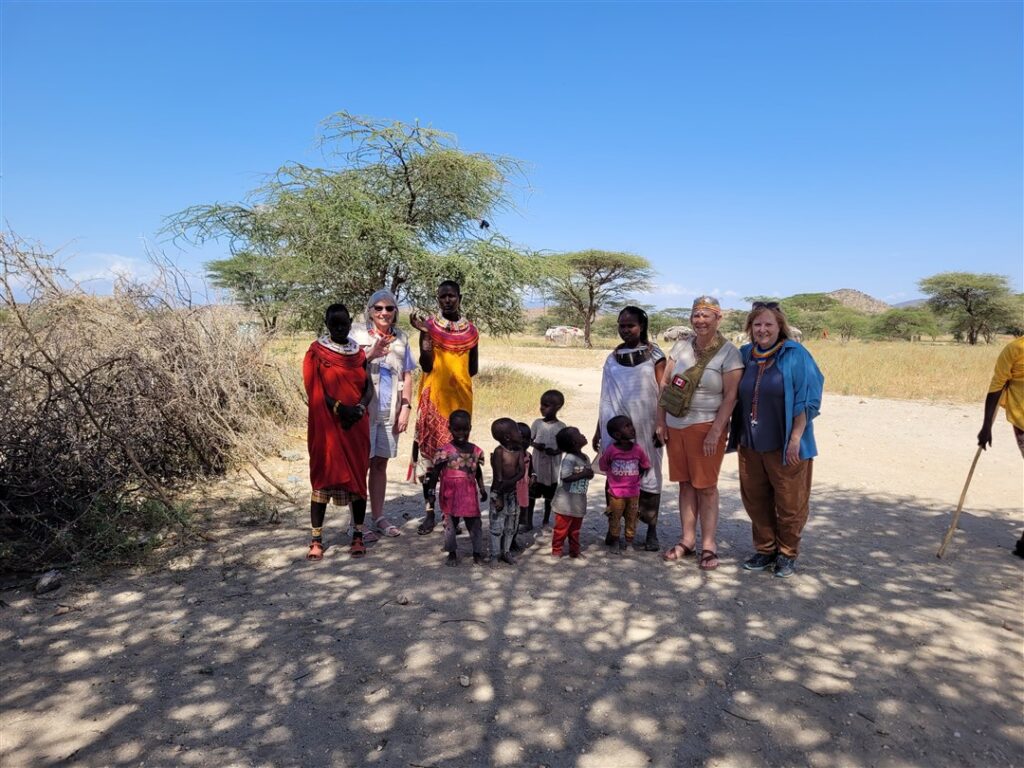 DWC volunteers with local women and children Kenya