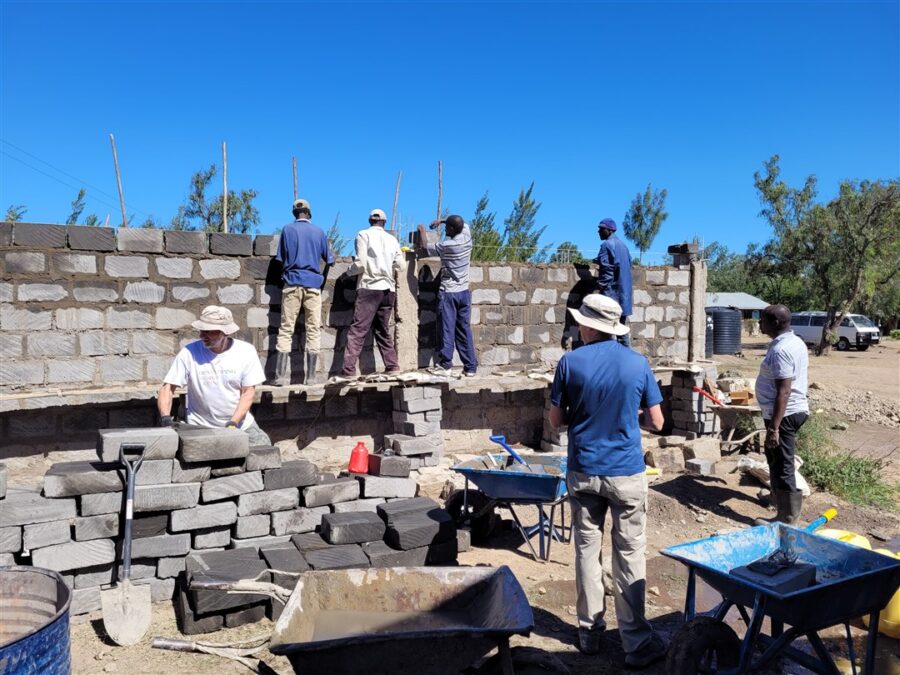 DWC volunteers working with local tradespeople on project Kenya