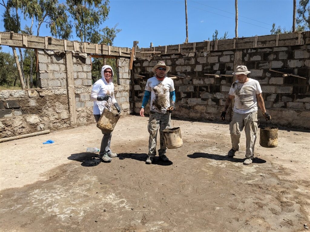 Dirty DWC volunteers at project site Kenya