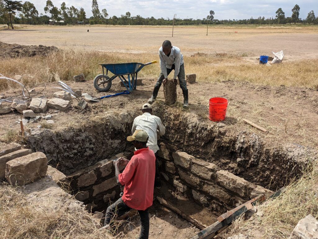 Concrete block Latrine hole Kenya