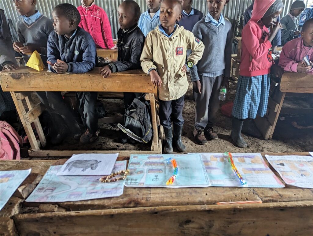 Schoolkids and artwork in classroom in Kenya