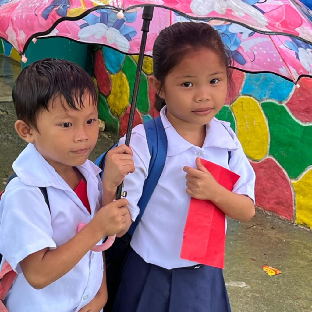 Young school kids in school uniforms Philippines