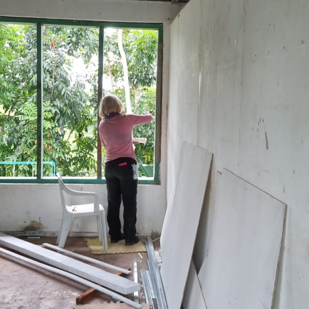 Volunteer working inside classroom project site Philippines