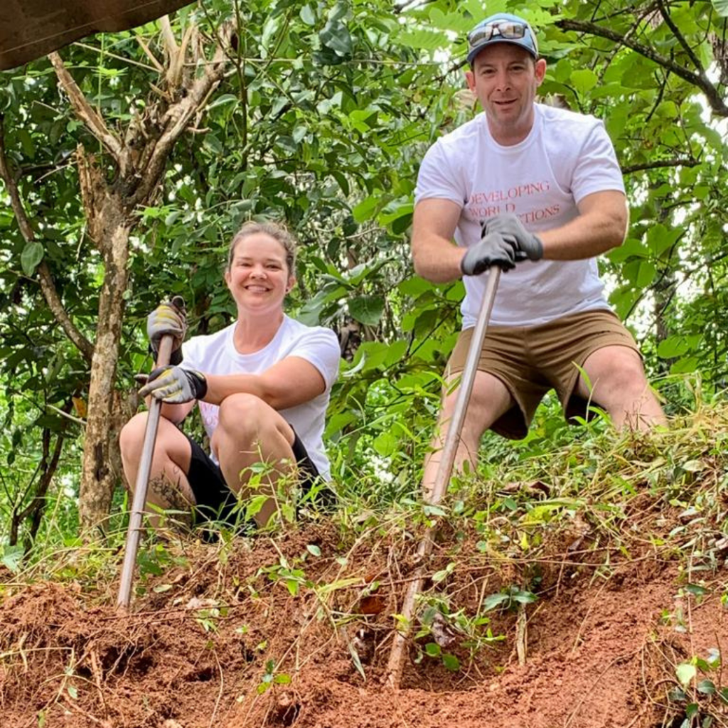 volunteers digging with shovels Sri Lanka