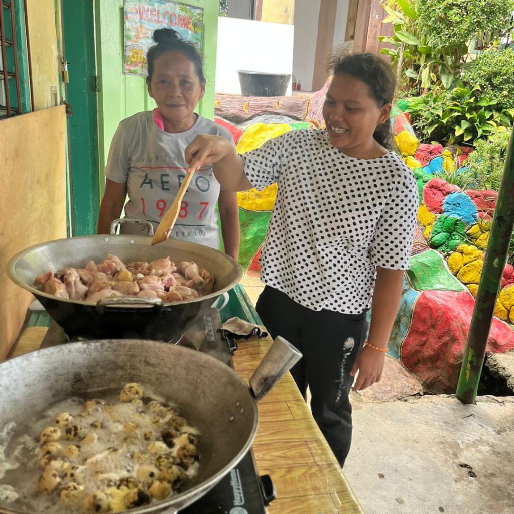 Locals cooking Philippine food