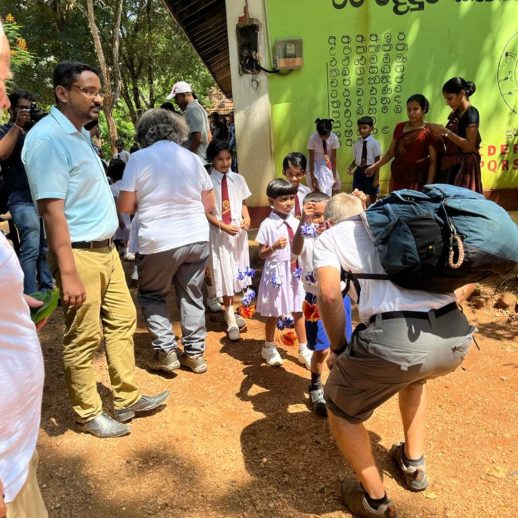 Schoolchildren greeting volunteers Sri Lanka