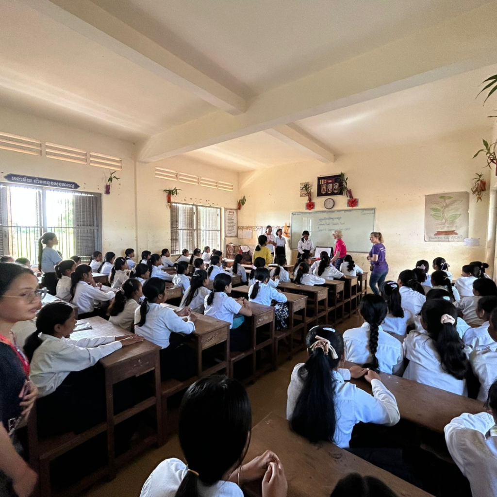 DWC volunteers discussing personal Hygiene with students Cambodia