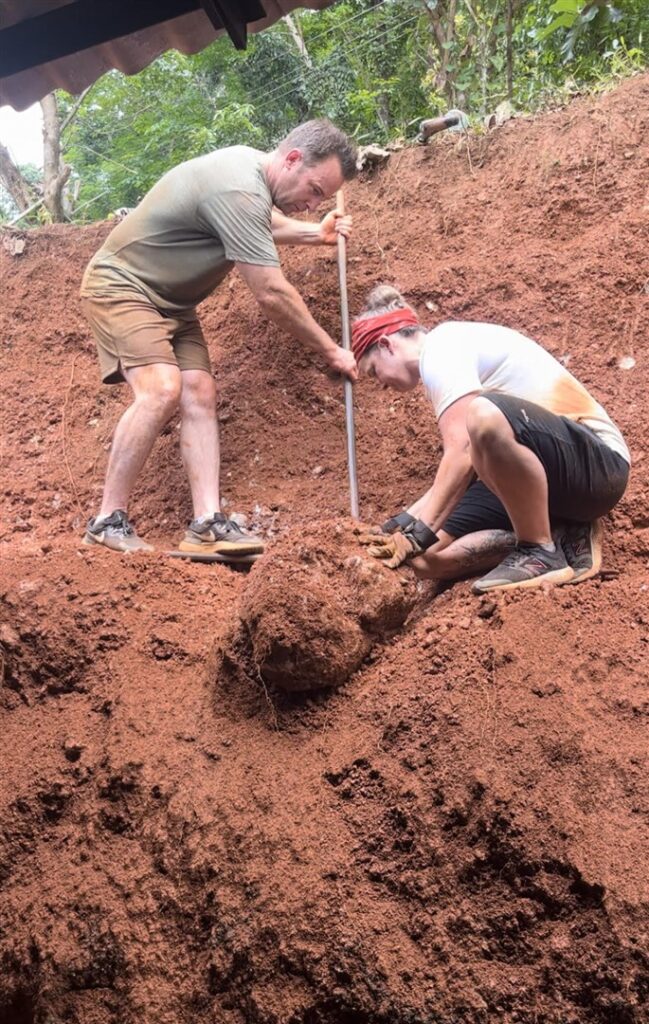 DWC volunteers working with rocks in dirt Sri Lanka