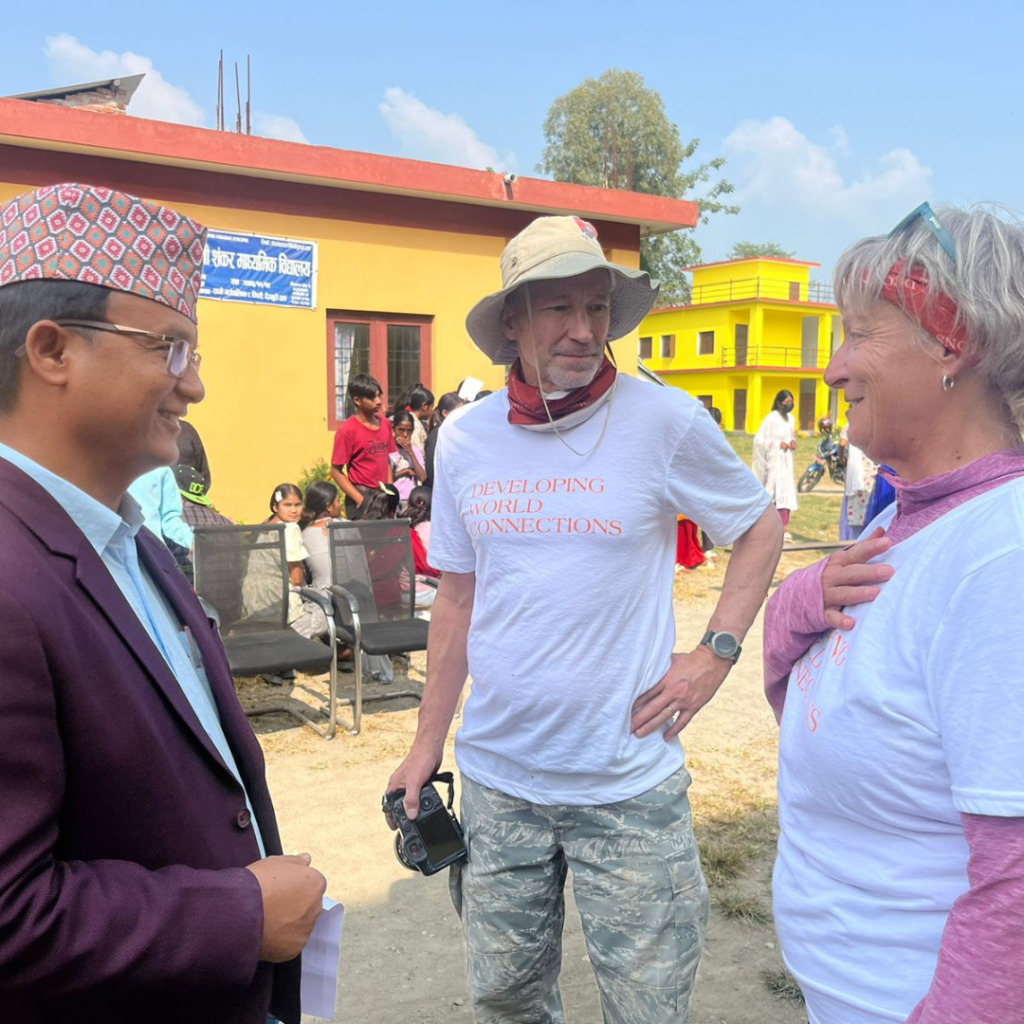 Volunteers speaking with local Nepal