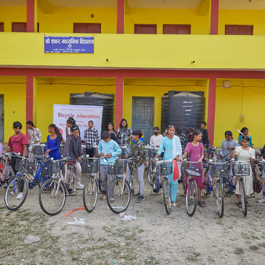 Local children outside with bicycles Nepal