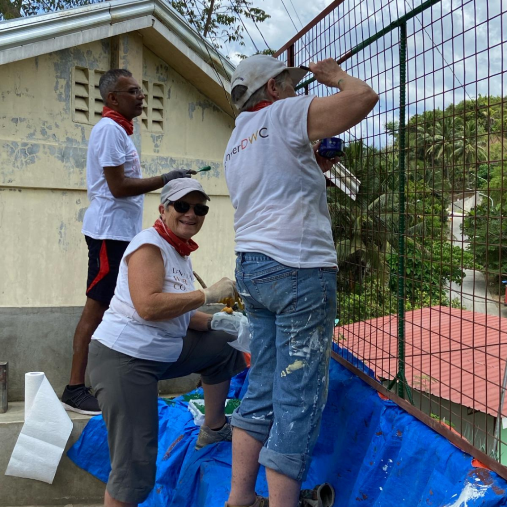 Painting back fence at school Philippines