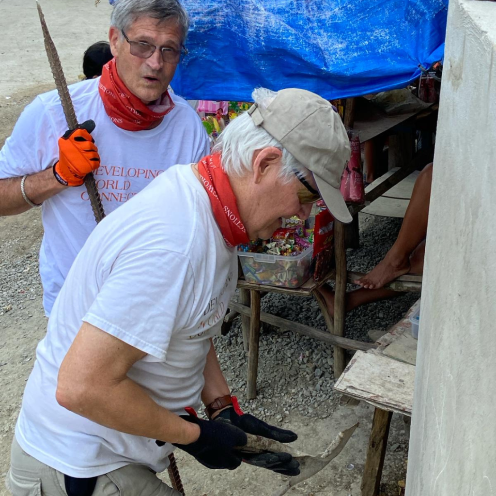 DWC volunteer working with shovel Philippines