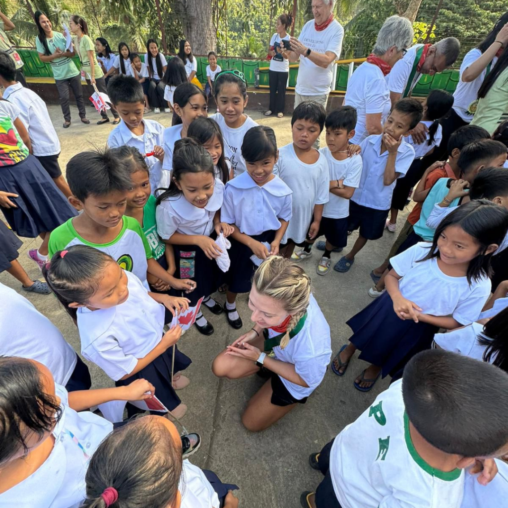 DWC volunteer and Philippine Schoolchildren