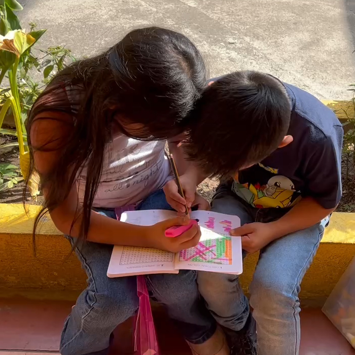 School children in Guatemala doing word find puzzle Guatemala
