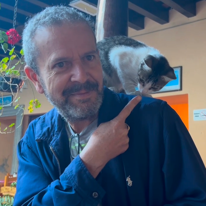 Cat on shoulder of local Guatemala