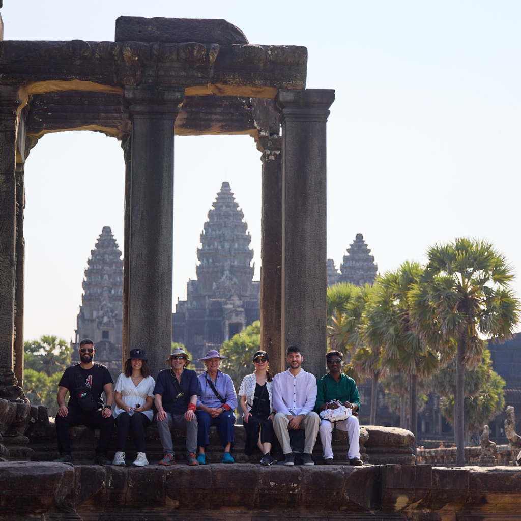 Salesforce team posing in front of temple Cambodia