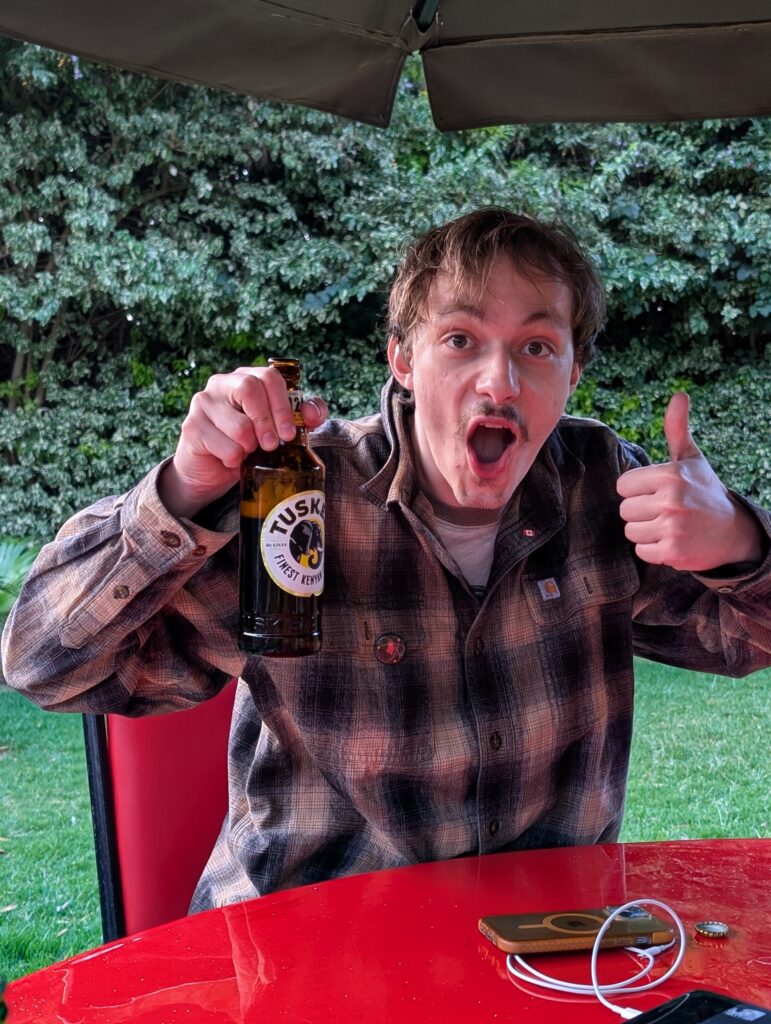 Volunteers drinking beer Kenya