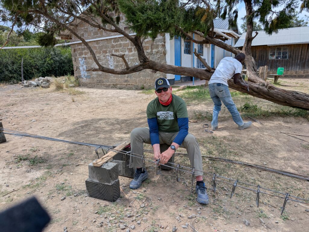 Volunteer working with rebar Kenya