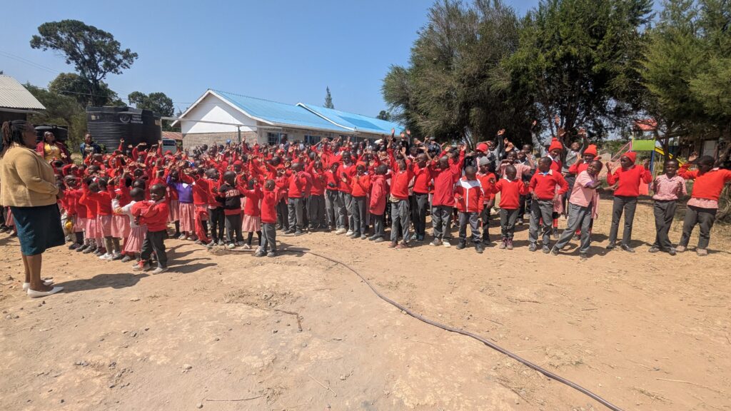 Students and school staff saying goodbye to volunteers Kenya