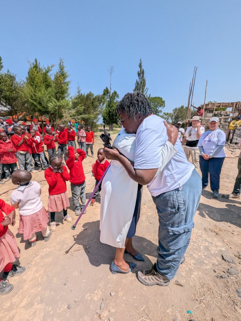 Students and school staff saying goodbye to volunteers Kenya