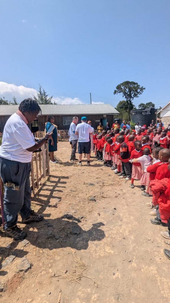 Students and school staff saying goodbye to volunteers Kenya
