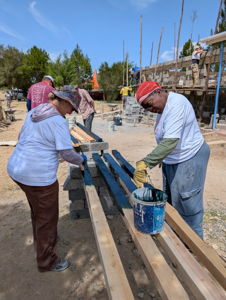 Painting beams Kenya