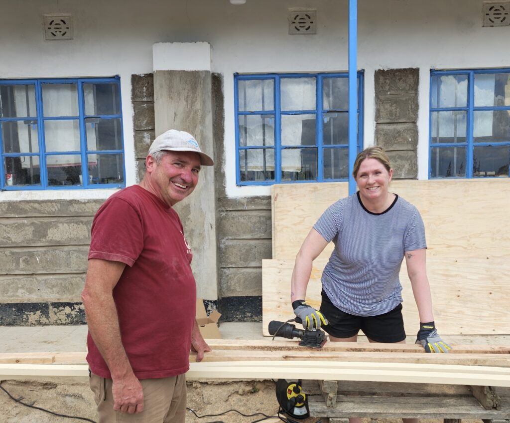 Sanding wood at project site in Kenya