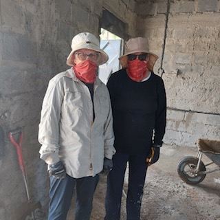 Volunteers standing in project site Kenya