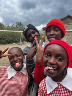 School kids making funny faces for the camera Kenya