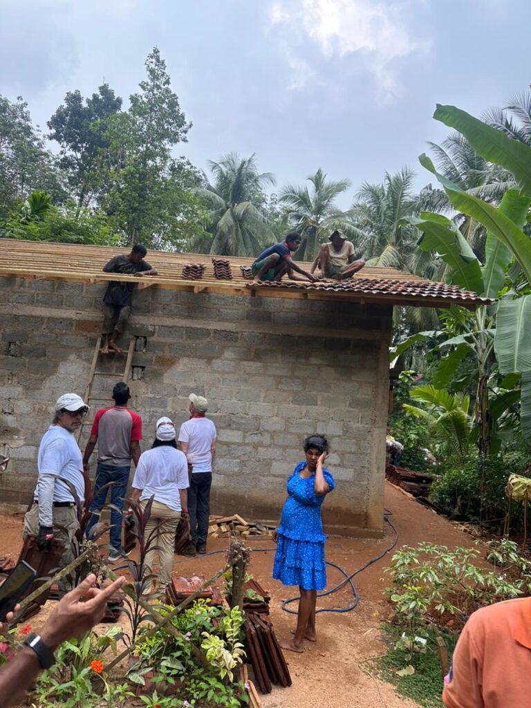 Workers on roof Sri Lanka