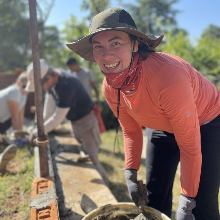 Volunteer working with cement Nepal