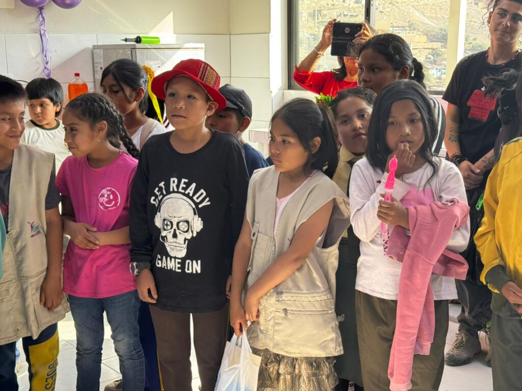 School children mingling inside school Peru