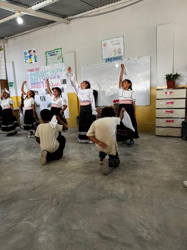 Children dancing in traditional dress Peru